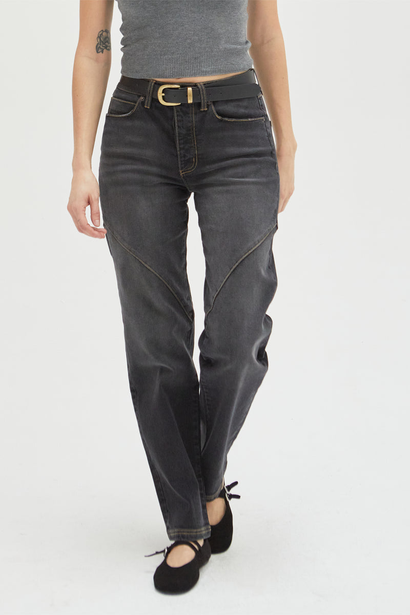Close-up of the high-rise straight leg jeans with stylish seam detailing, featuring sustainable denim design and a flattering silhouette.