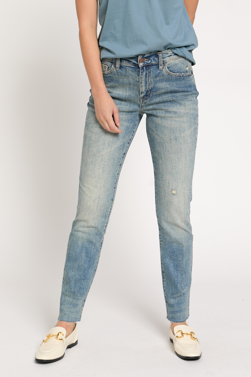Video of model walking in high rise straight leg jeans, demonstrating the flexibility and ease of movement in the vintage look.